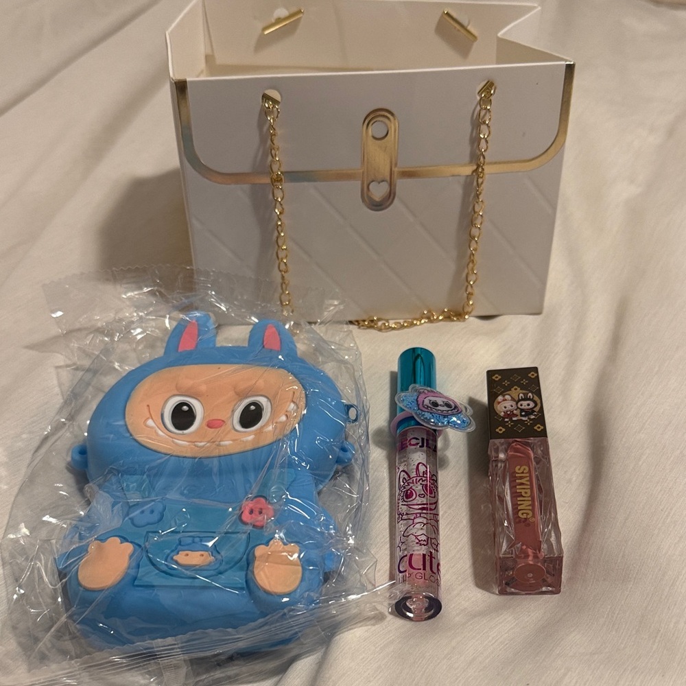 Blue Labubu Coin Purse and Lip Glosses